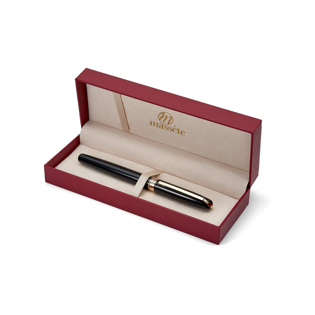Glossy black rollerball pen with gold-trimmed removable cap in red gift box