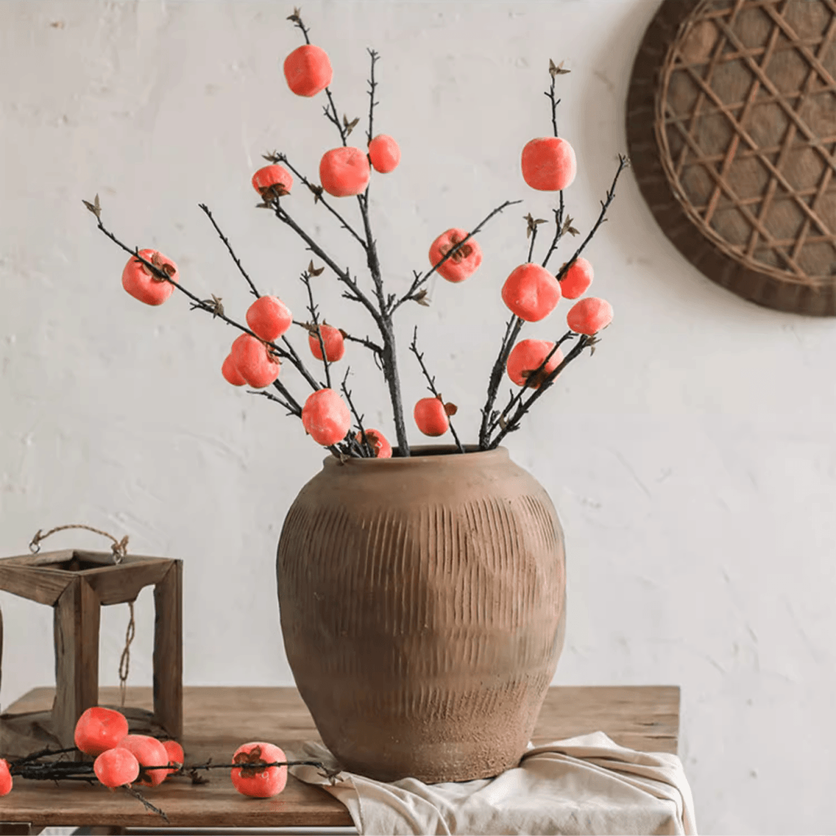 Brown ribbed earthenware round pot with wide opening and orange blossoms