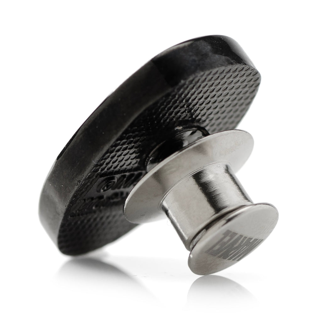 Silver cufflinks with black textured backs and polished metal fronts