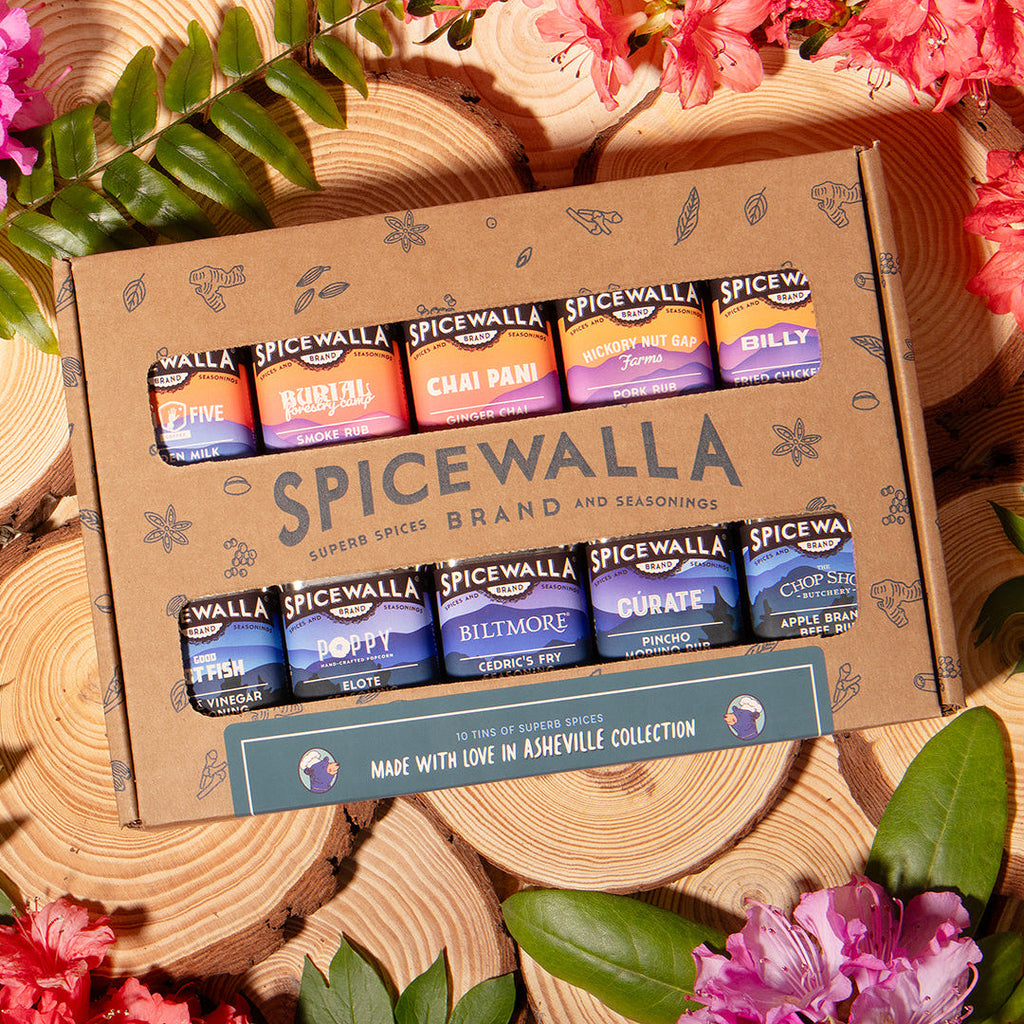 Spicewalla 10-pack spice gift box with labeled seasoning canisters on kraft carton