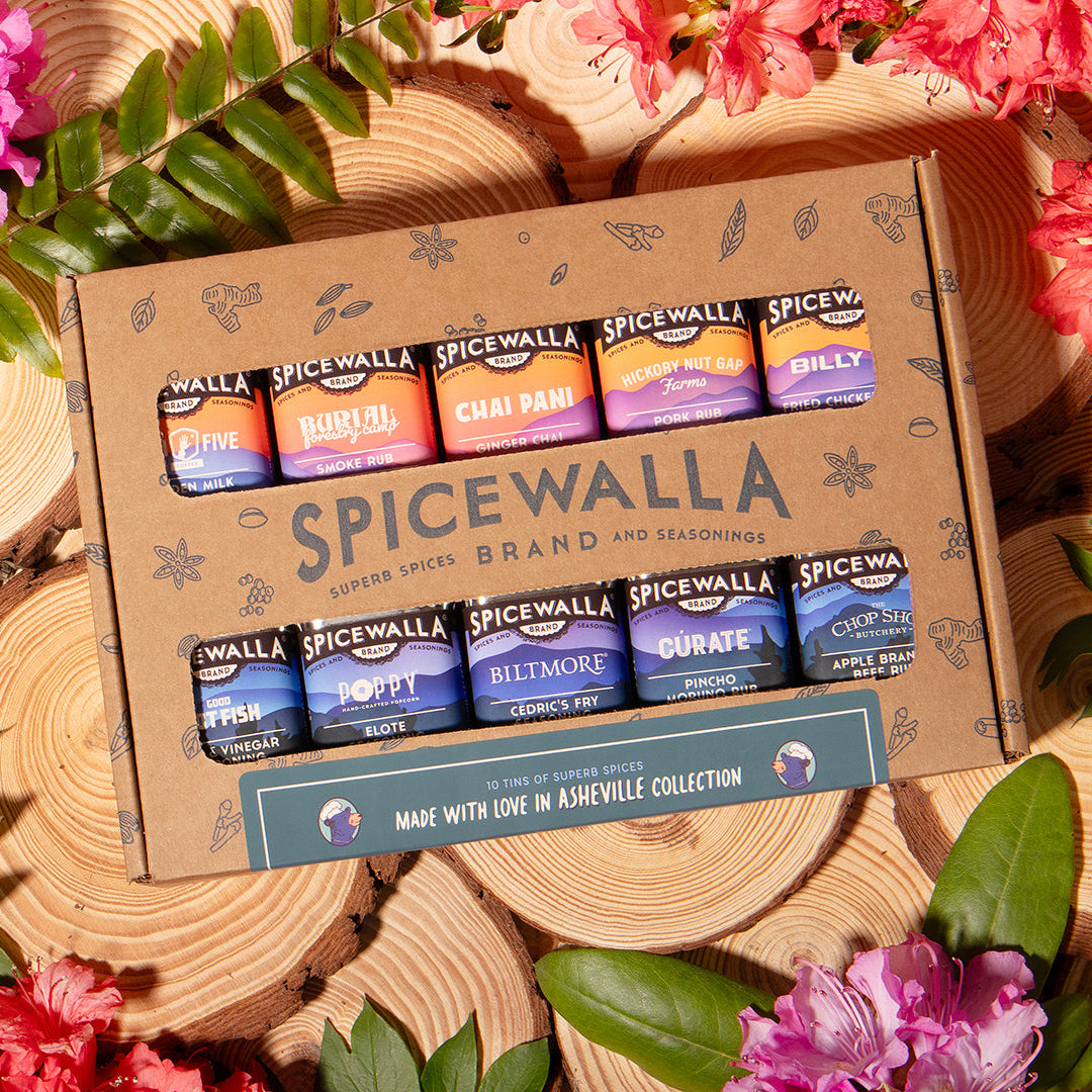Spicewalla 10-pack spice gift box with labeled seasoning canisters on kraft carton