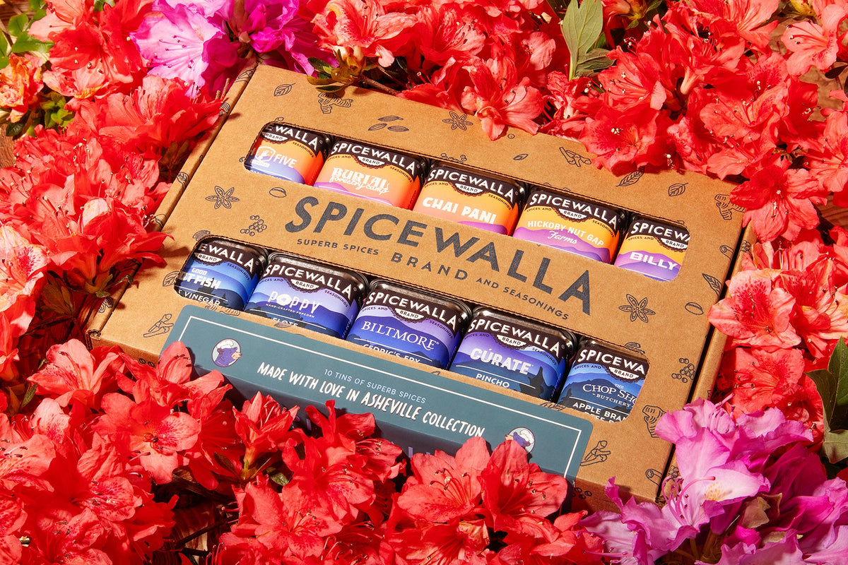 Spicewalla 10-pack spice gift box showing colorful labeled seasoning canisters