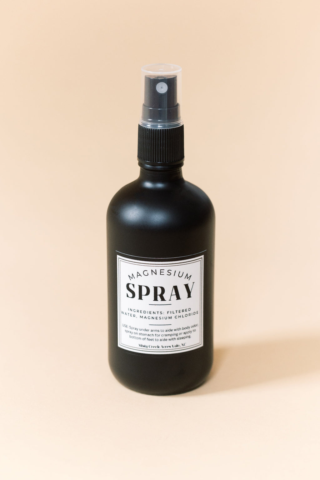 Magnesium spray bottle with clear mist sprayer, front label facing forward
