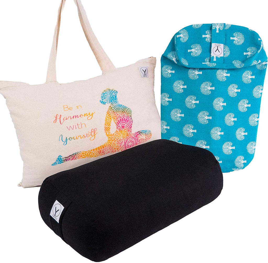 Travel yoga bolster set with black bolster, teal elephant-pattern cover, and canvas carry bag