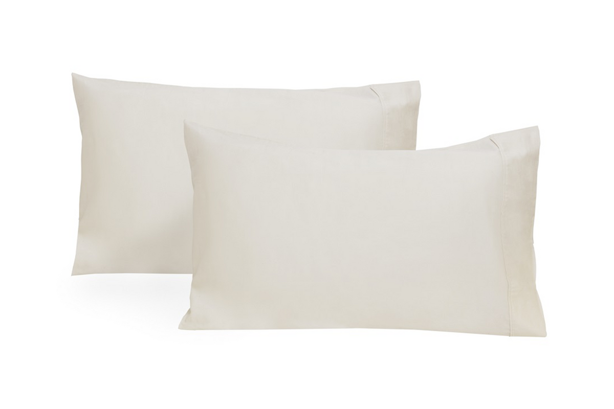 Two white pillowcases, rectangular shams with smooth sateen weave