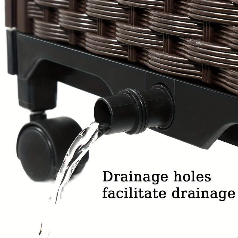 Black raised garden bed planter box with drainage spout and drainage holes