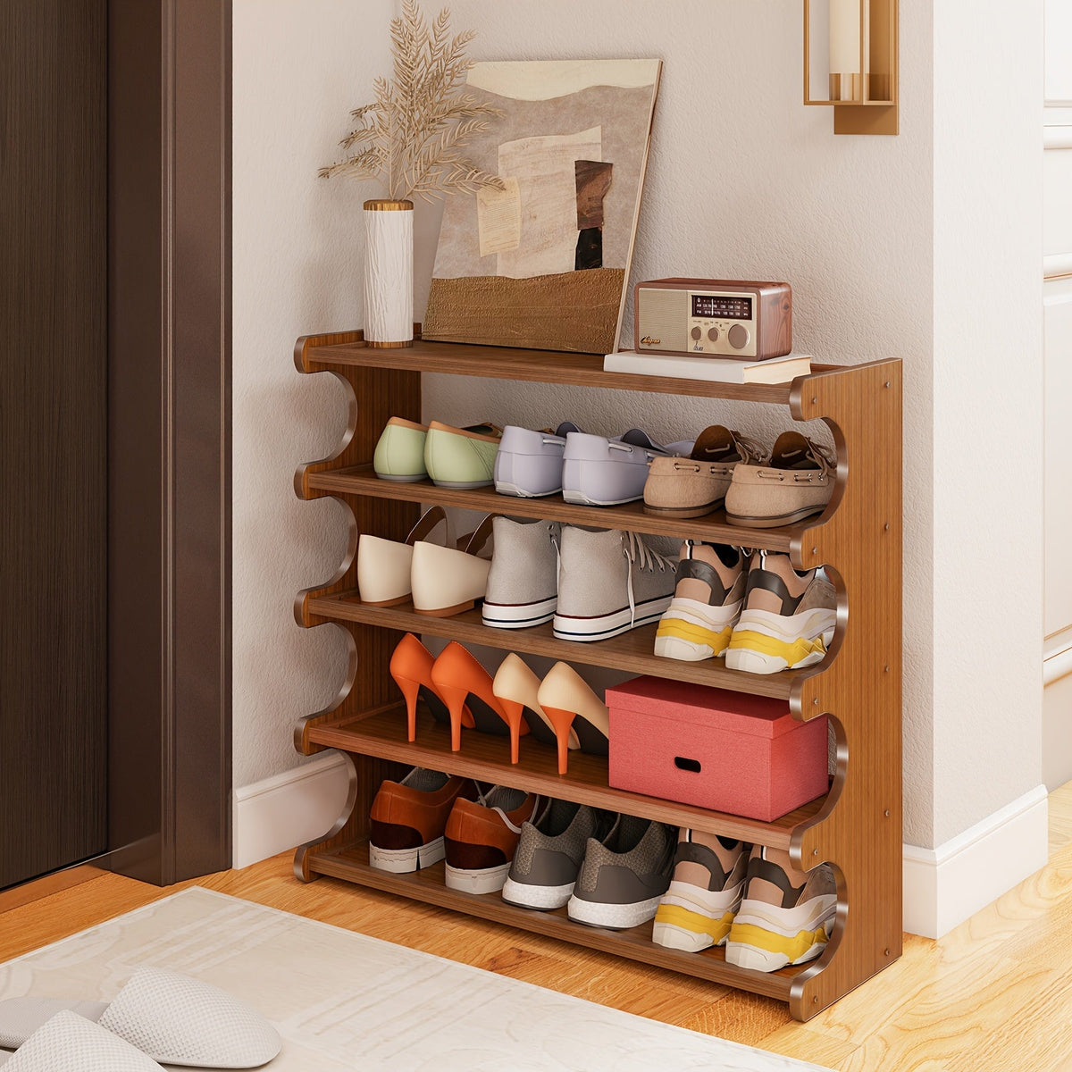 Bamboo 6-tier shoe rack organizer with side shelves holding shoes and one bin