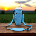 Blue crossbody tumbler tote bag with front zip pocket and adjustable shoulder strap