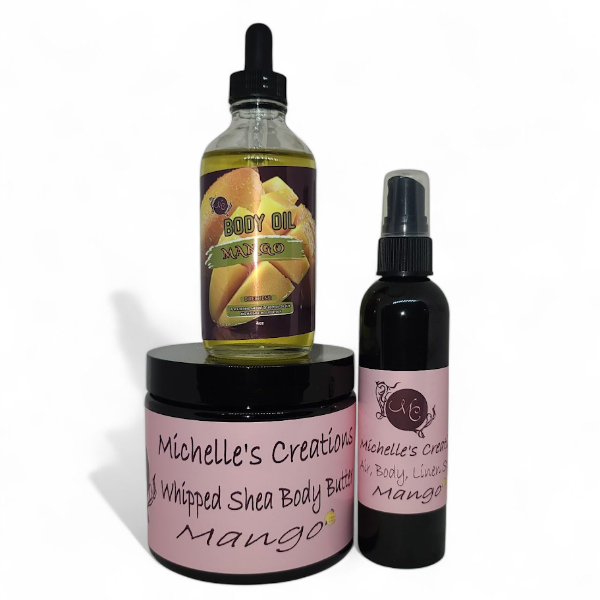 Body care gift set with body oil, whipped shea body butter, and air spray—Mango