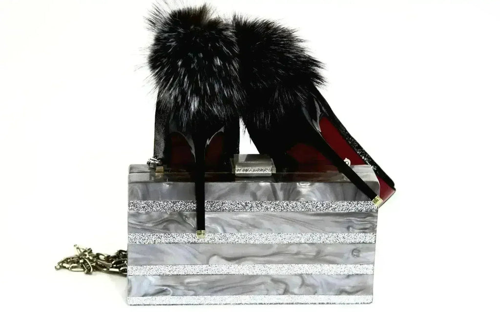 Silver stripe box clutch with faux fur black handle and shoulder chain