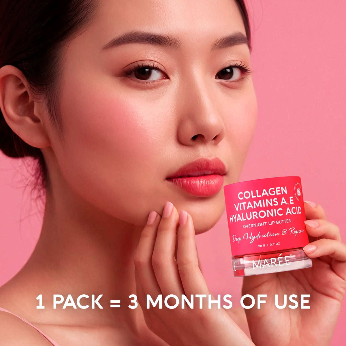 Lip mask balm jar held near lips with glossy pink balm on mouth
