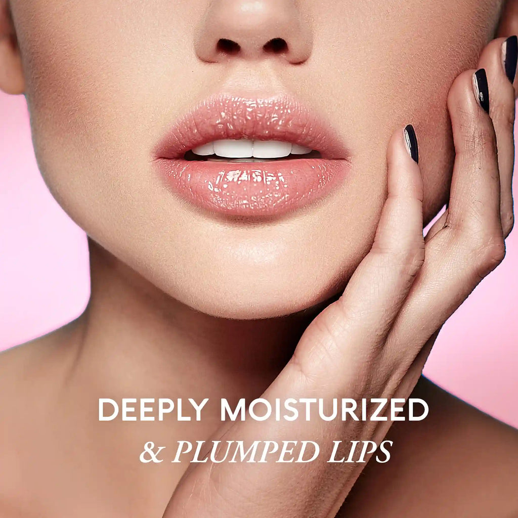 Glossy pink lip mask balm on lips with hands gently framing cheeks