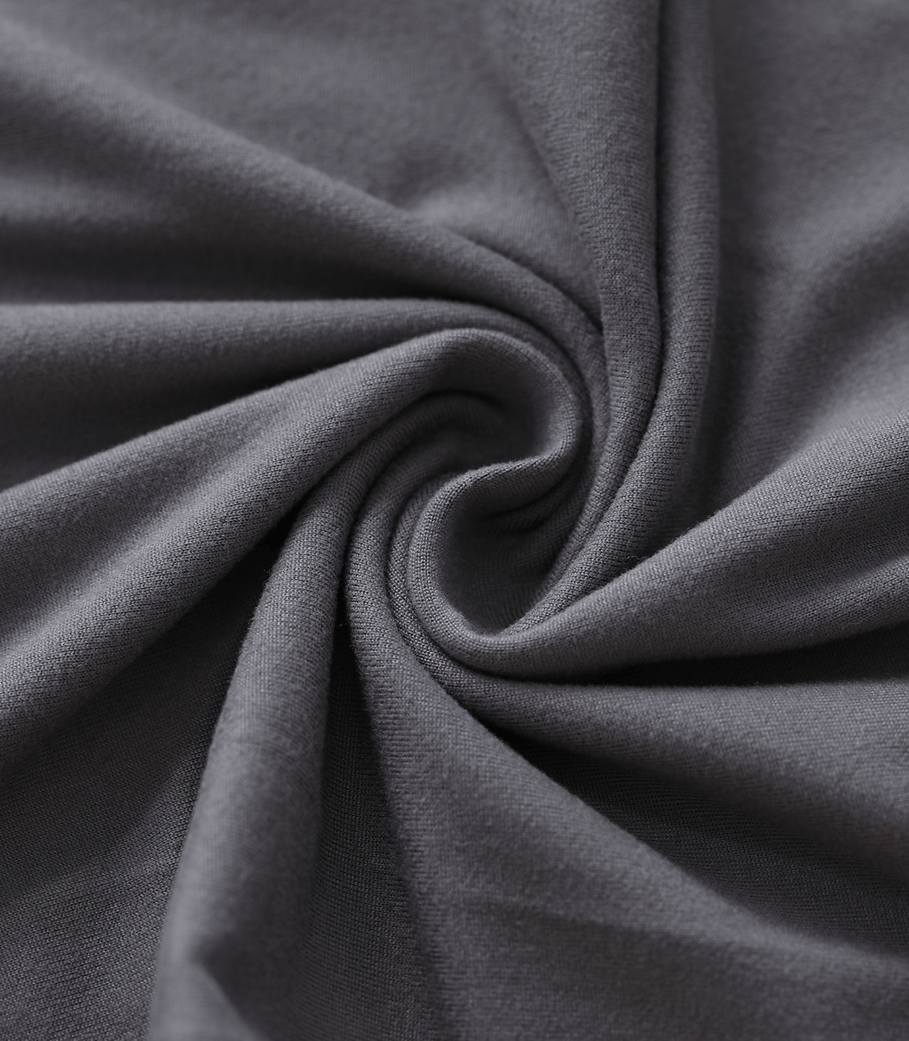 Gray maternity trouser fabric close-up with smooth knit texture