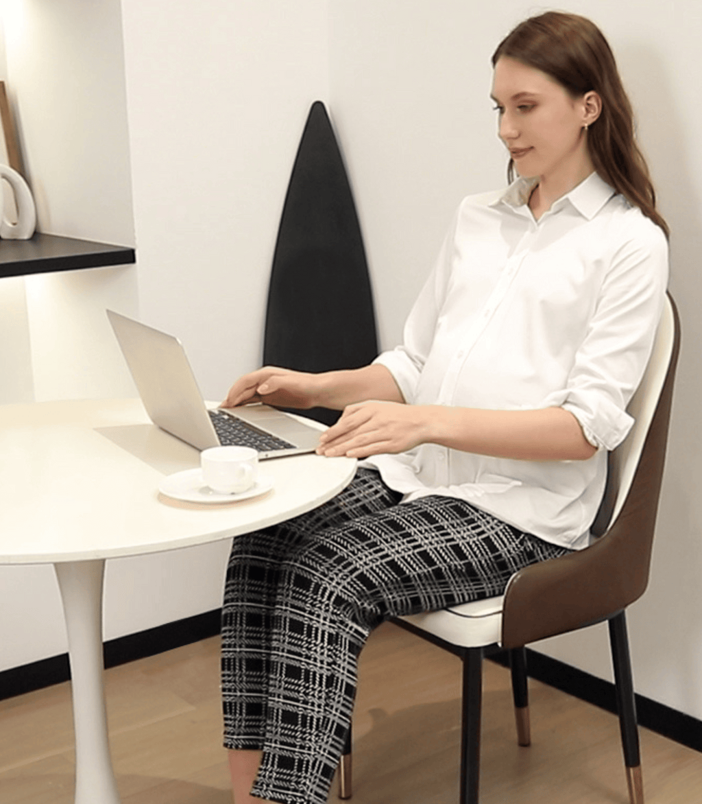 Plaid maternity trouser pants worn with a white shirt, straight fit