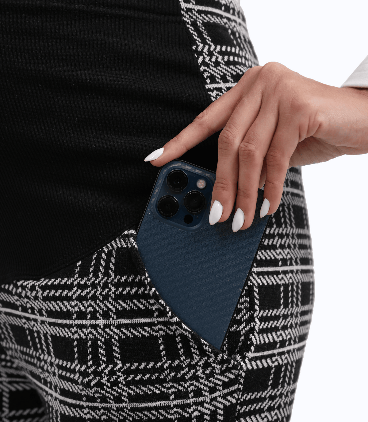 Plaid maternity trouser pants with side pocket; phone held near pocket