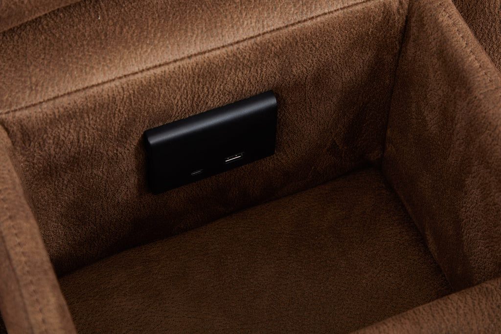 Brown power reclining sectional console with control panel on inner side