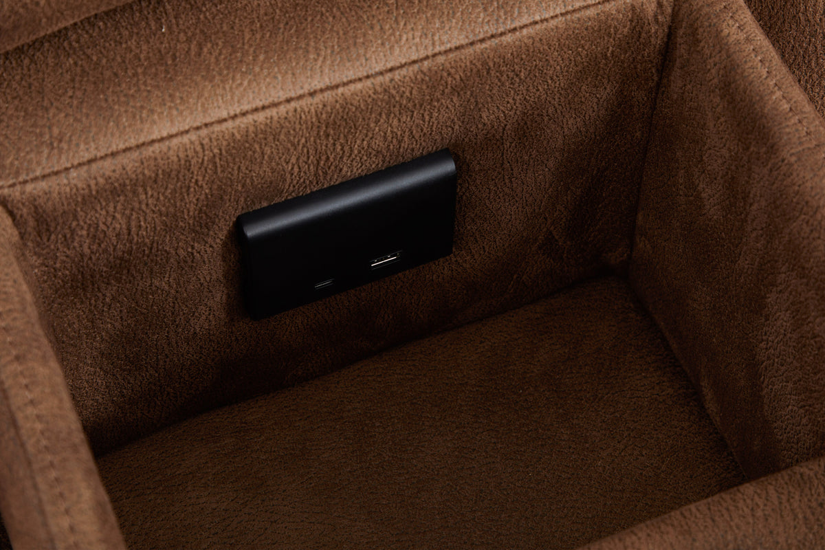 Brown power reclining sectional console with control panel on inner side