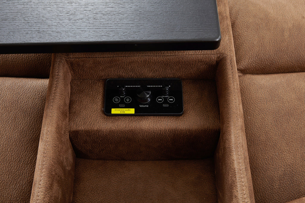 Mocha brown recliner with embedded power controls panel and volume settings