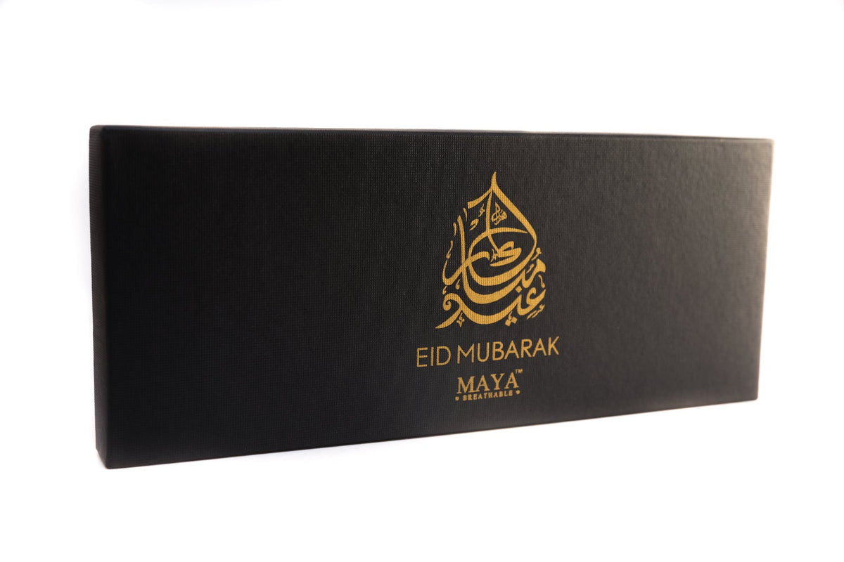 Eid gift set box with gold Eid Mubarak and MAYA Breathable logo