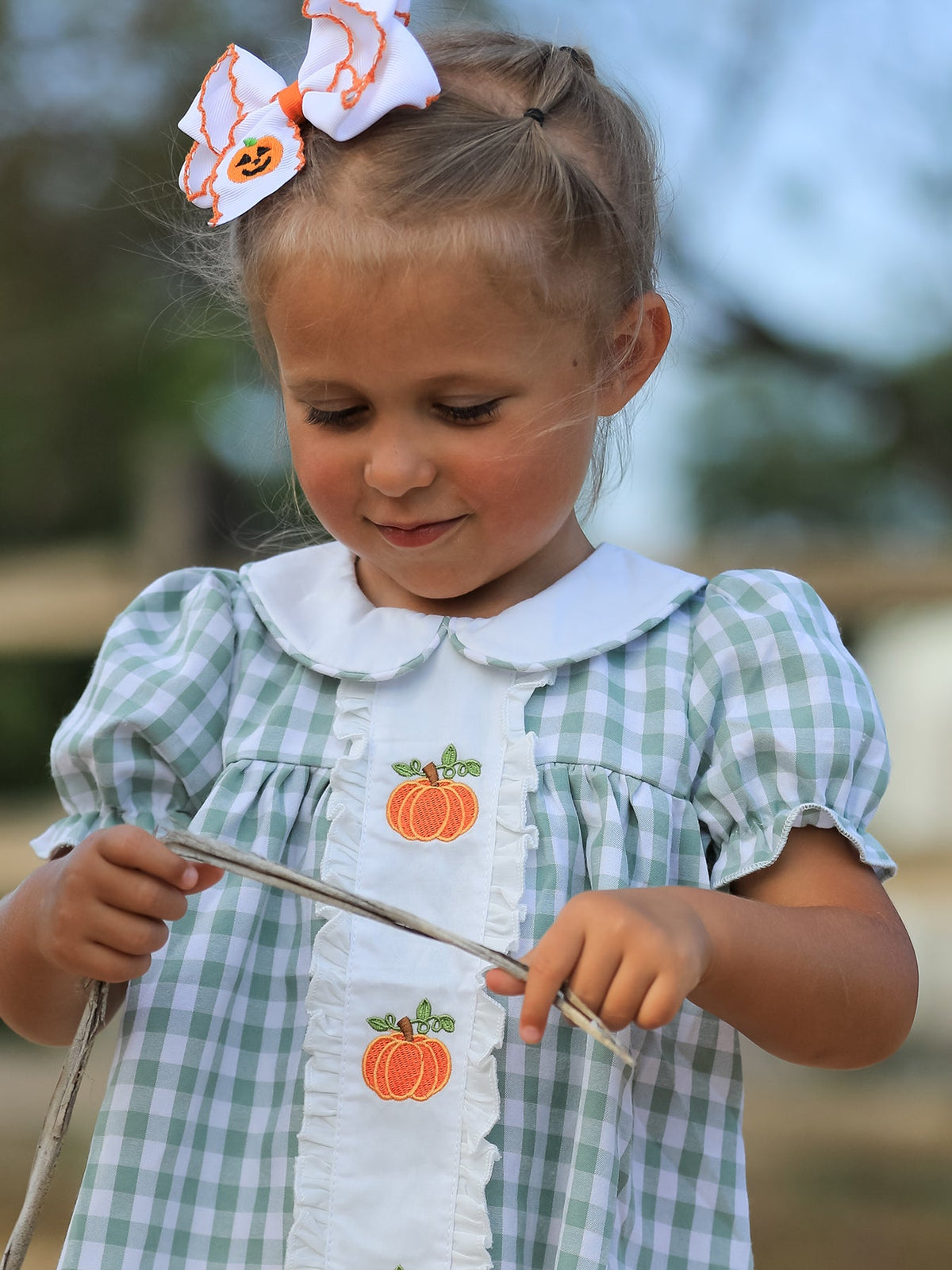 Green gingham girls dress with white collar, pumpkin applique placket, puff sleeves