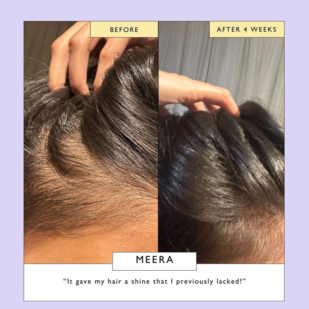 Scalp + hair oil applied to scalp with hands, showing shine on dark hair