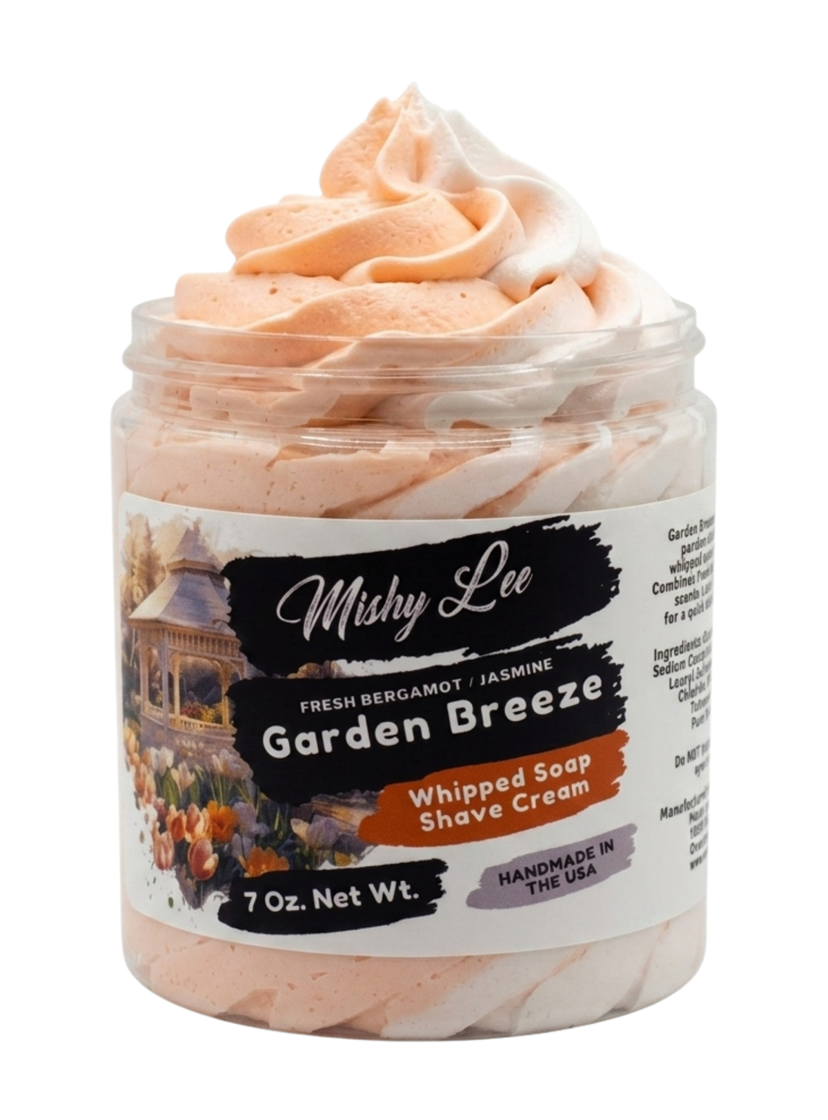 Peach-toned whipped soap and shave cream in clear jar, front label
