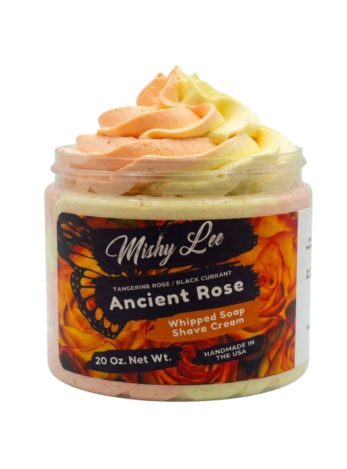 Whipped soap and shave cream in clear jar with rose-colored swirl cream top
