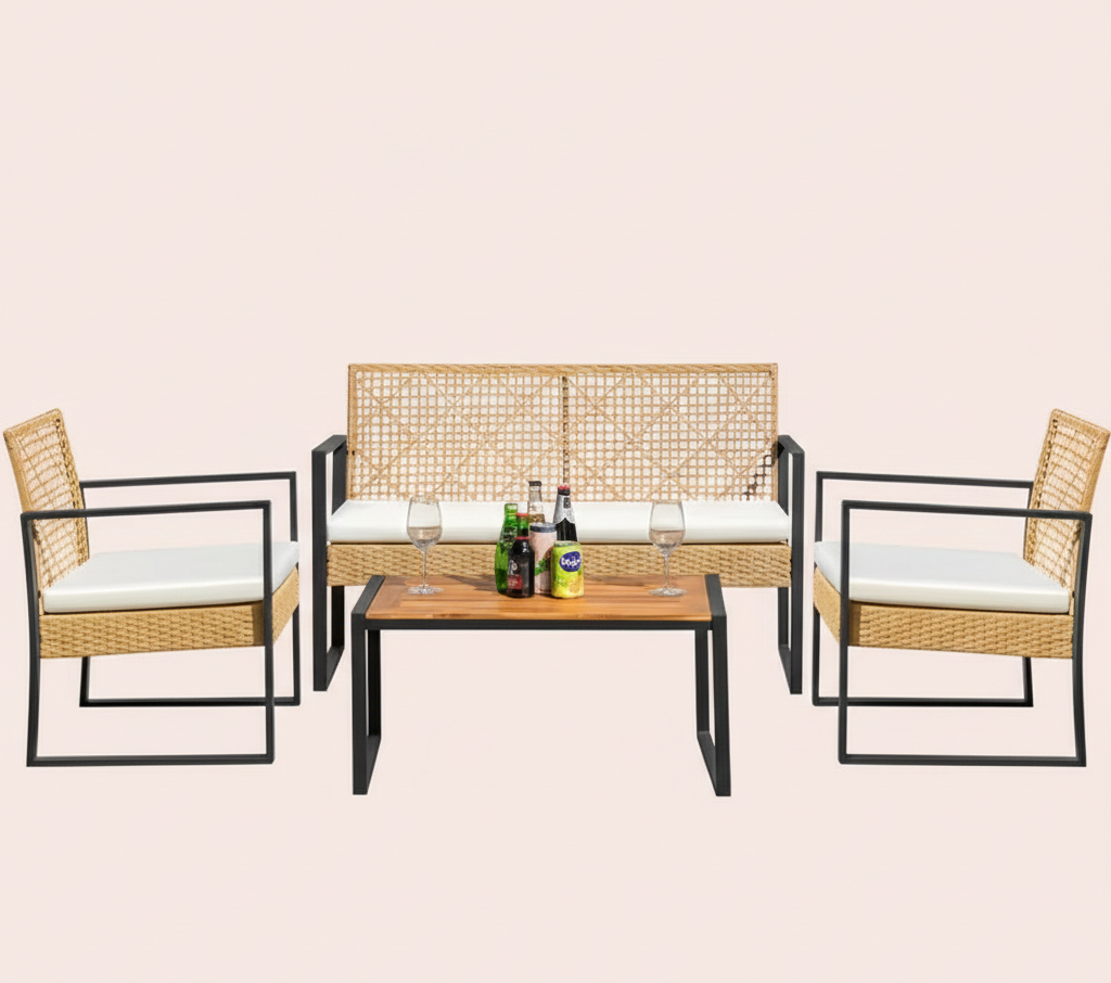 Tan wicker patio loveseat set with white cushions, two matching chairs, and wood coffee table