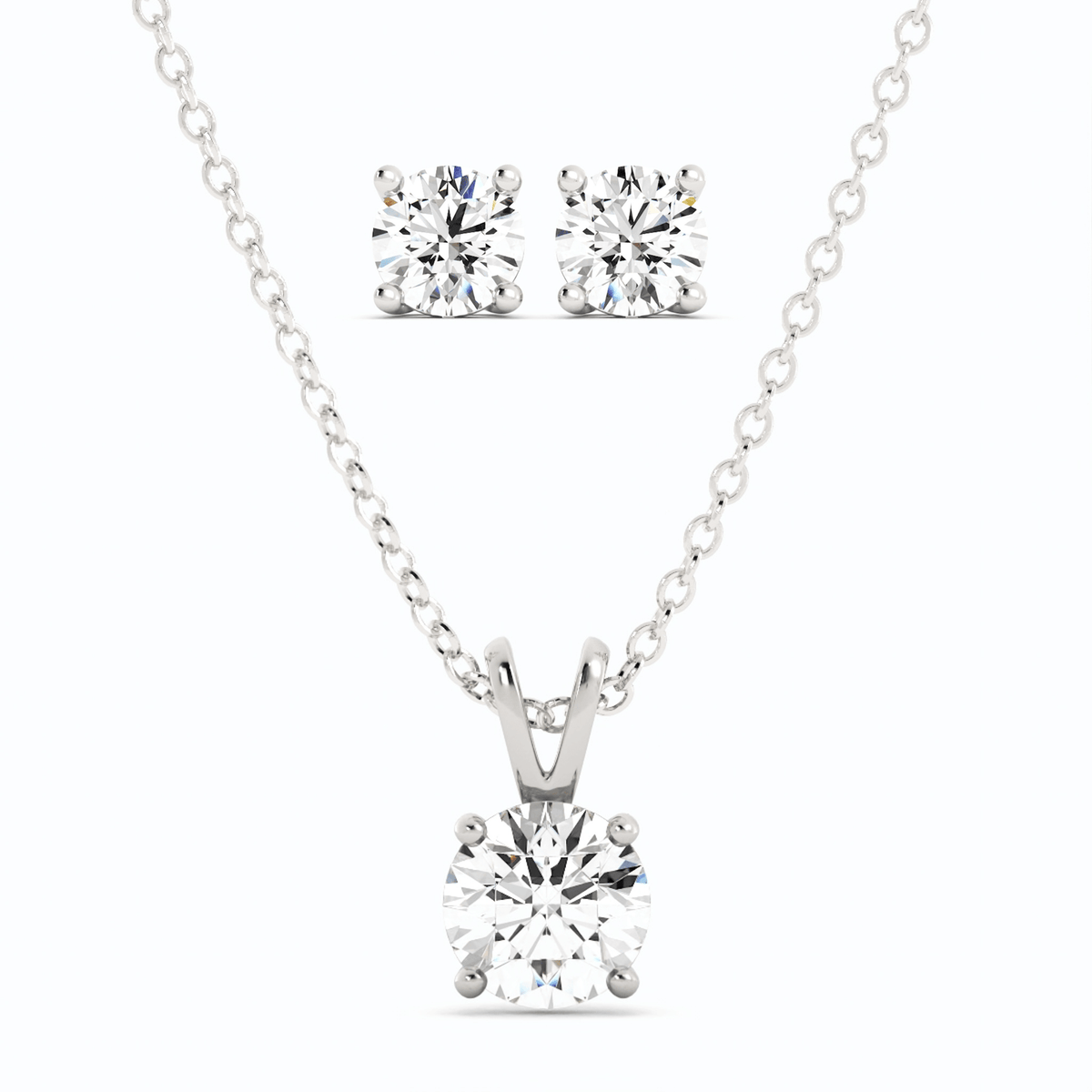 Moissanite stud earrings and round pendant on chain, white gold overlay