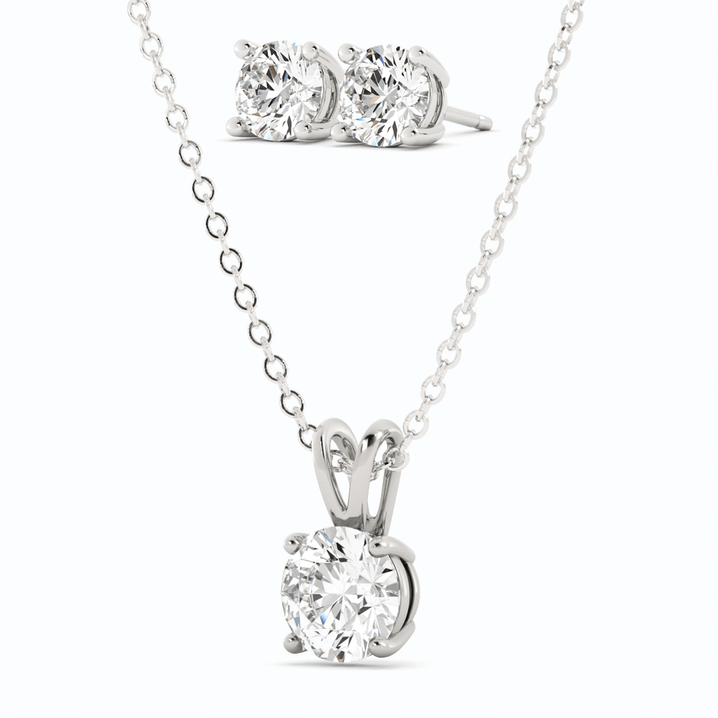Round moissanite pendant with chain and two matching stud earrings, white gold overlay