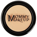 Concealer compact with beige cream shade in black round case