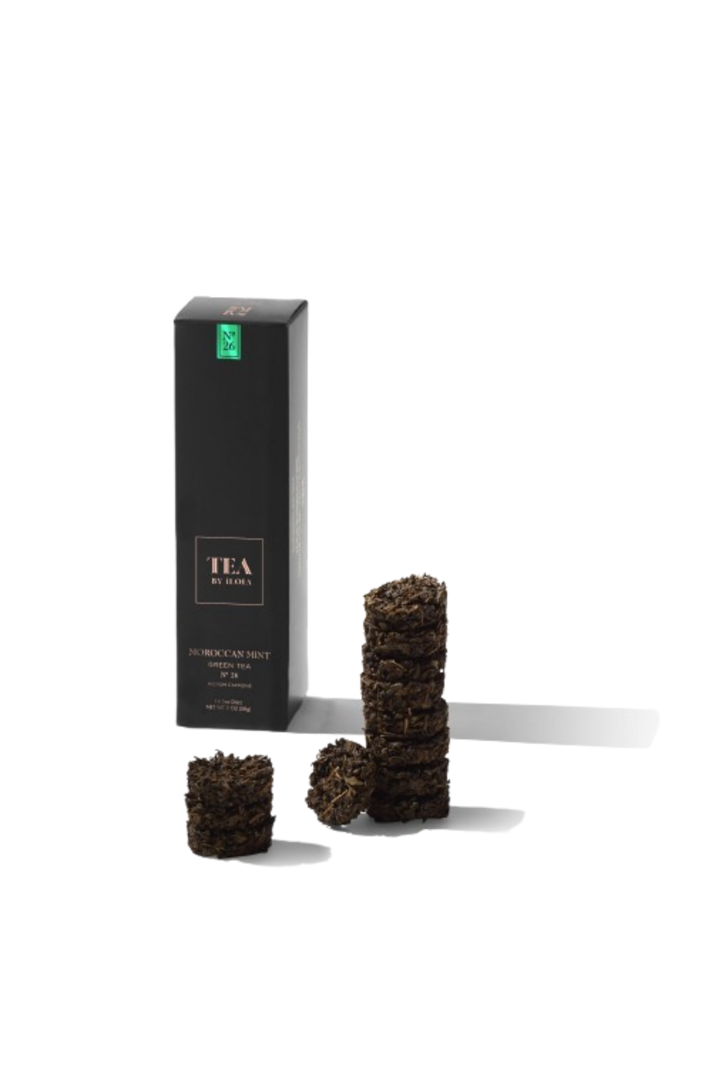 Moroccan mint tea discs beside a tall black tea box