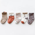 Toddler 5-pack crew socks featuring fox designs, stripes, and solid colors in neutral tones