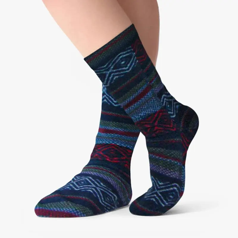 Kids' fleece socks, navy with geometric Nordic shapes and red/green stripe accents