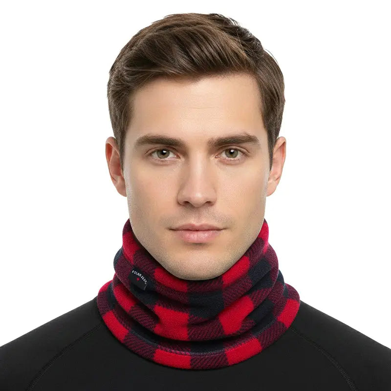 Fleece neck warmer in red and black buffalo plaid, worn around the neck loop.