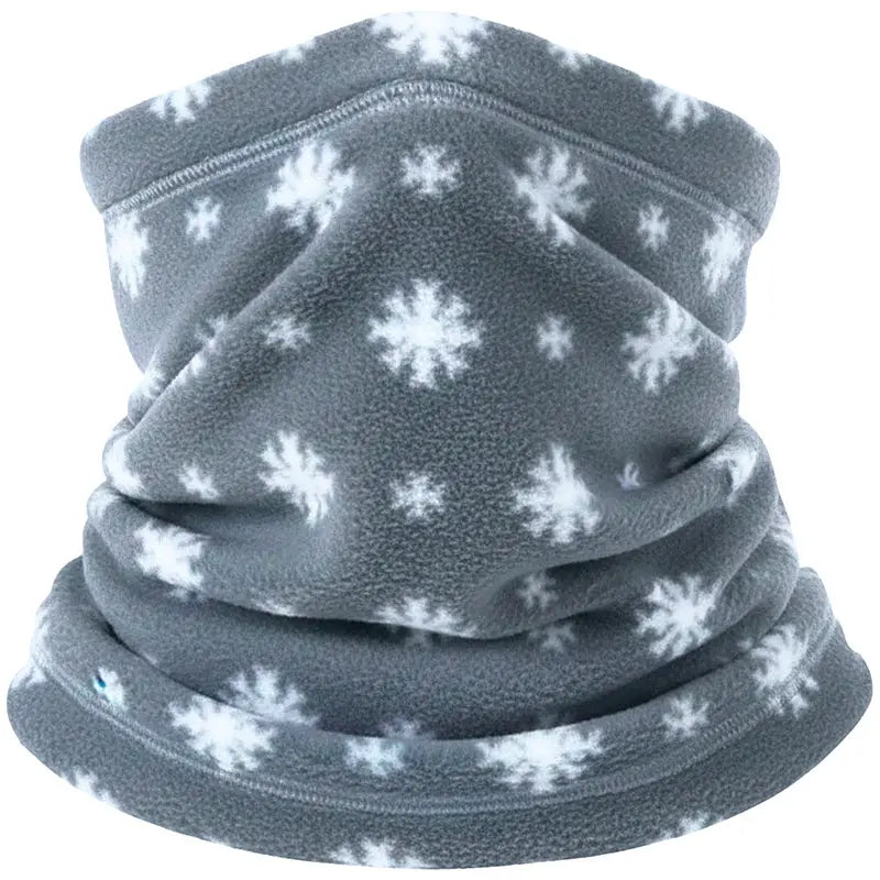 Fleece neck warmer in dark gray with white snowflake pattern, snug loop fit