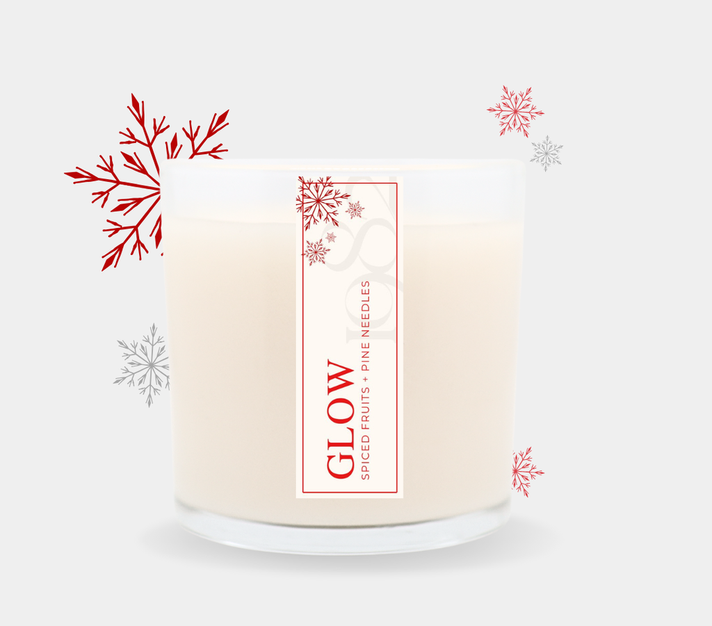 14oz Glow scented candle jar with spice fruits and pine needles label