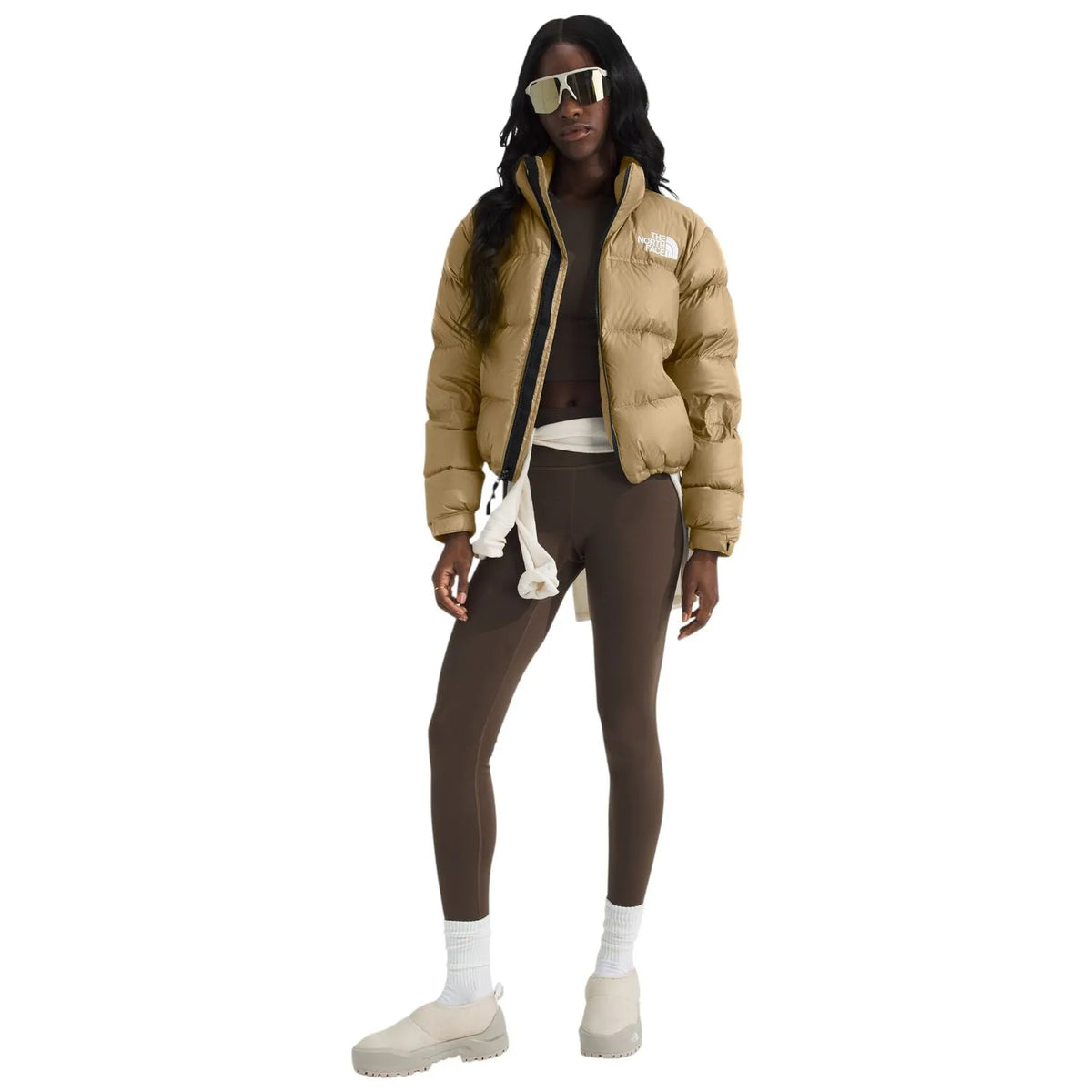 Women's khaki puffer jacket with stand collar, zip front, and The North Face chest logo