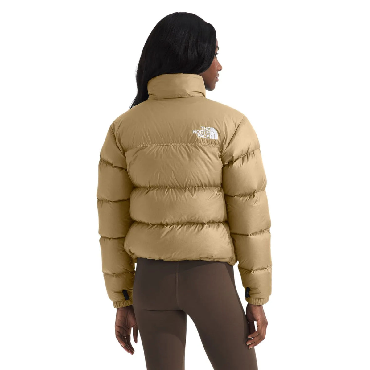 Women's khaki puffer jacket back view with insulated baffles and The North Face logo