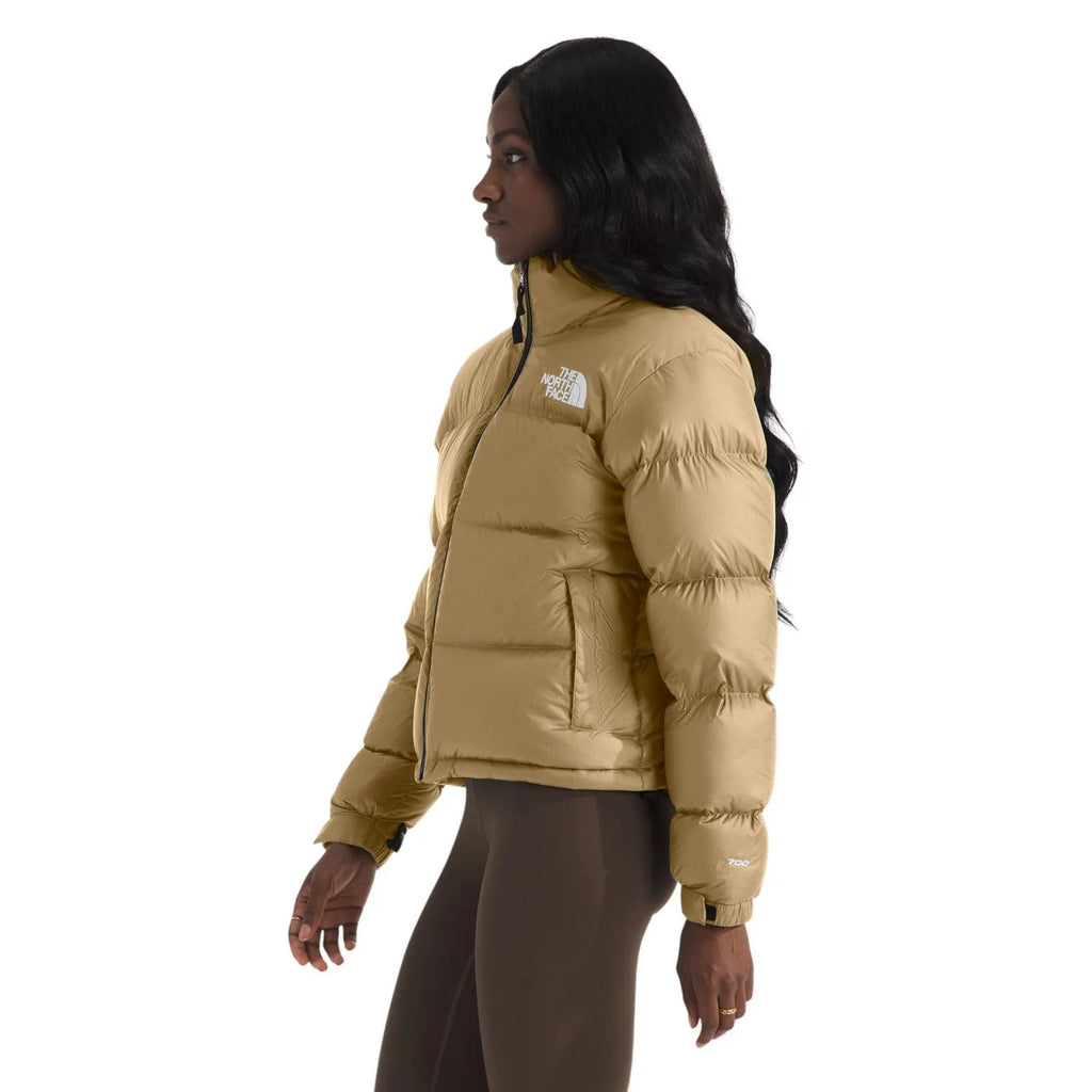 Women's khaki quilted puffer jacket side view with zip front and cuff quilting
