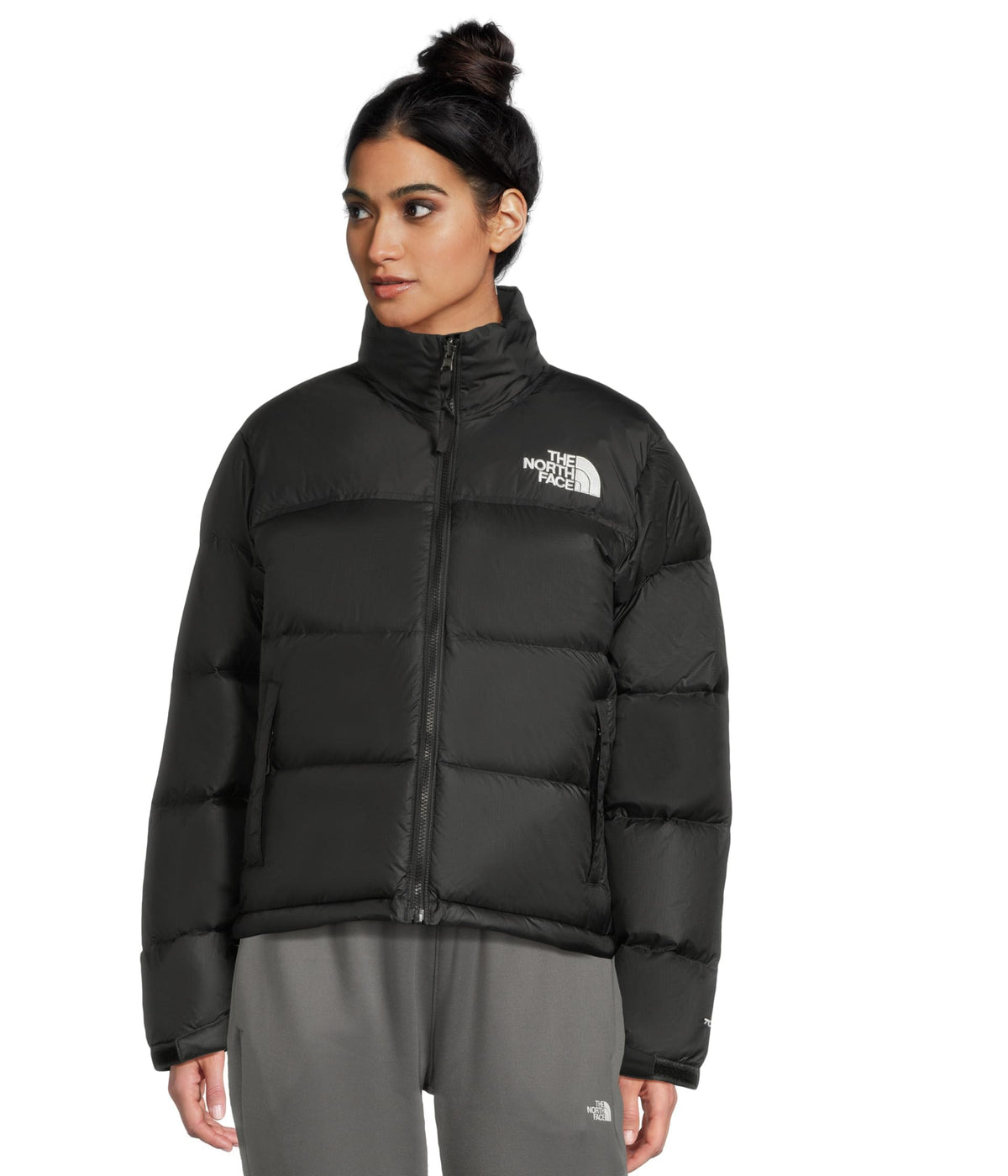Women’s black insulated puffer jacket with high collar, front zip and logo