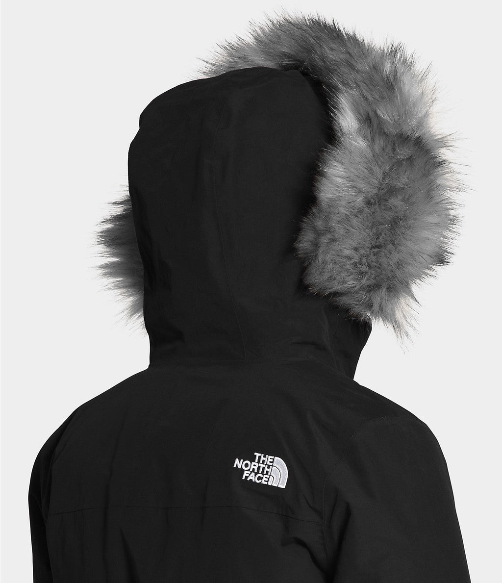 Women’s black Arctic Parka hood close-up with faux-fur trim