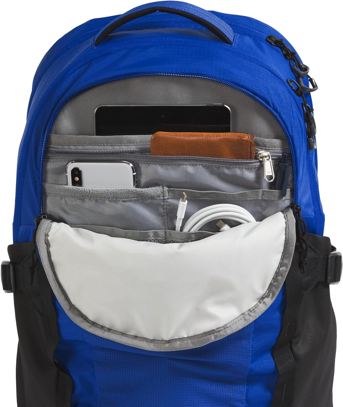 Blue laptop backpack with open top compartment showing organizer pockets and sleeves.