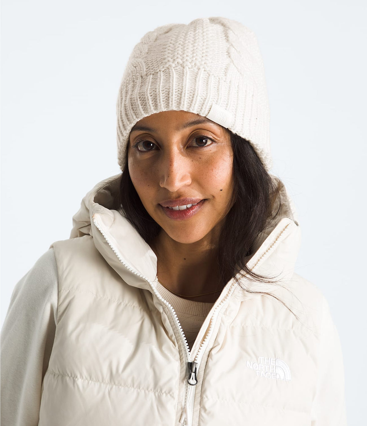 White dune ribbed-knit beanie with cable texture