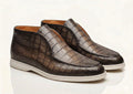 Brown alligator-embossed loafers with moc toe and low white rubber sole, pair view