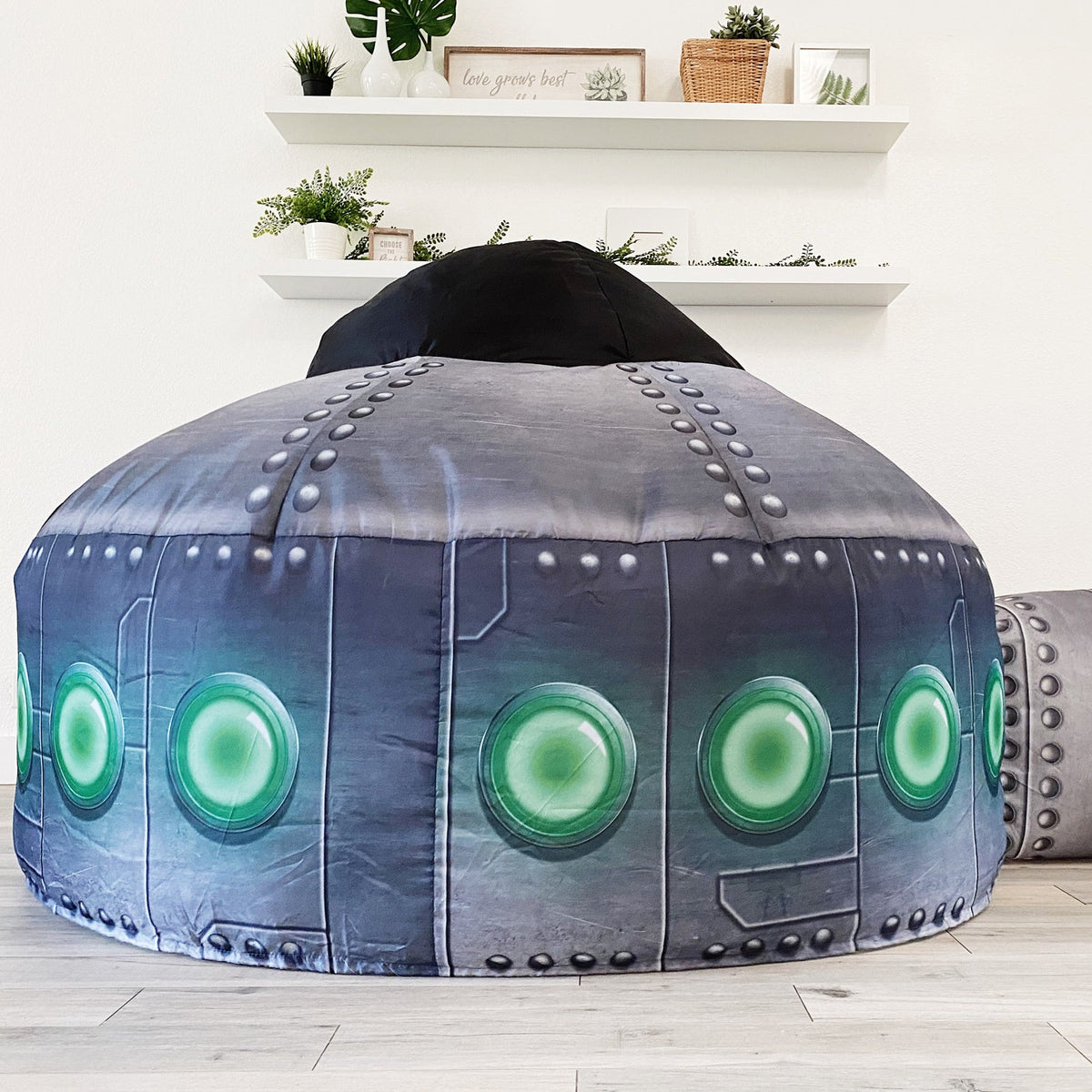Inflatable UFO play tent back view with green circular lights on gray-blue dome