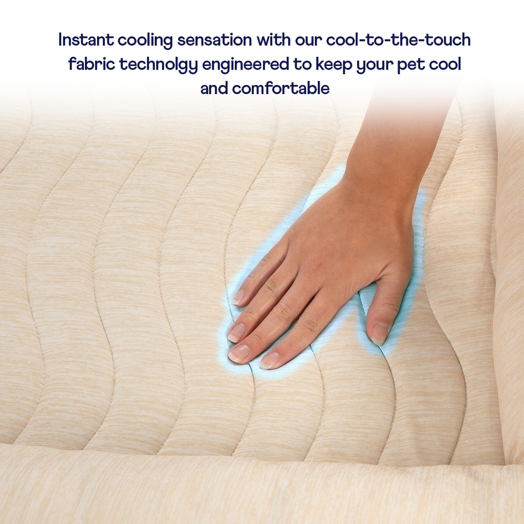 Cooling 4-bolster dog bed with light arctic sand fabric; hand pressing cooling surface