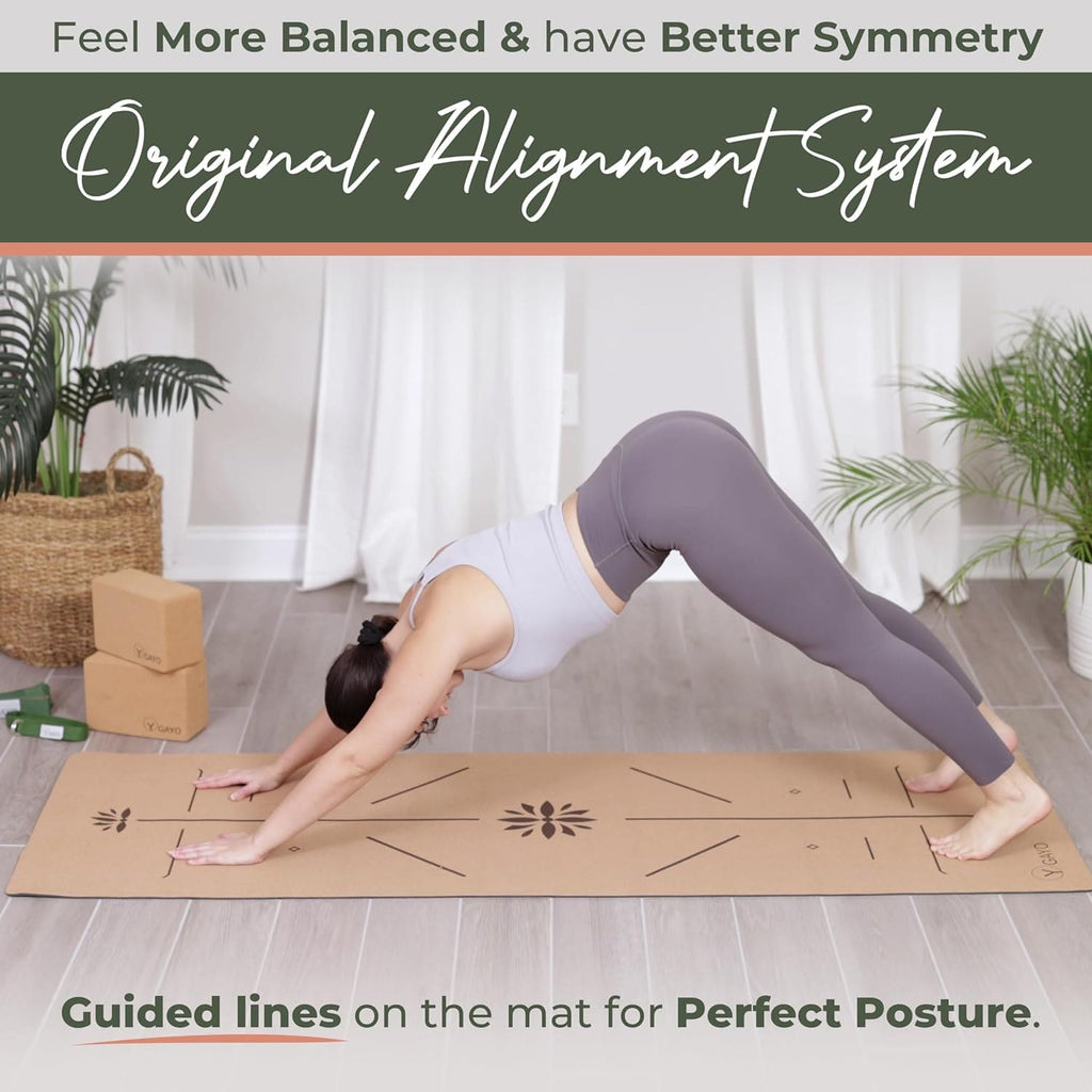 Cork yoga mat with guiding lines under a stretching pose