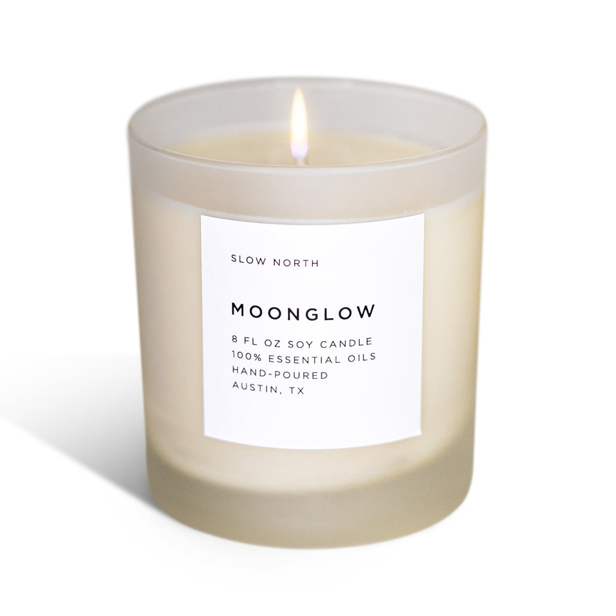 Moonglow scented candle jar with label and unlit wick