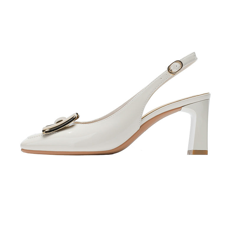 White slingback heel with square toe, chunky block heel, and gold buckle strap